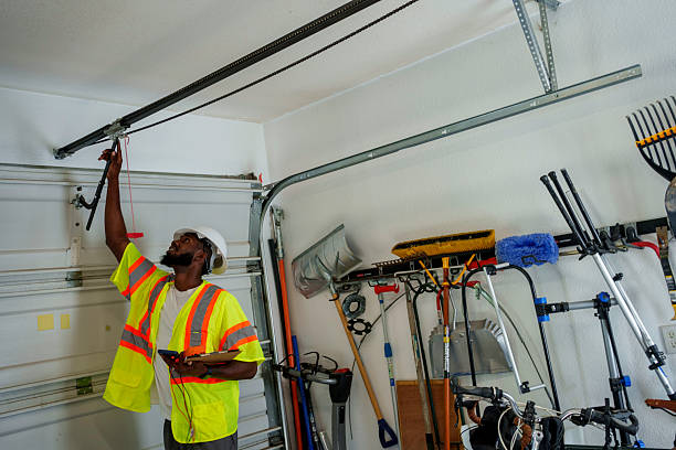 Professional Garage Door technician working in Blakely, PA